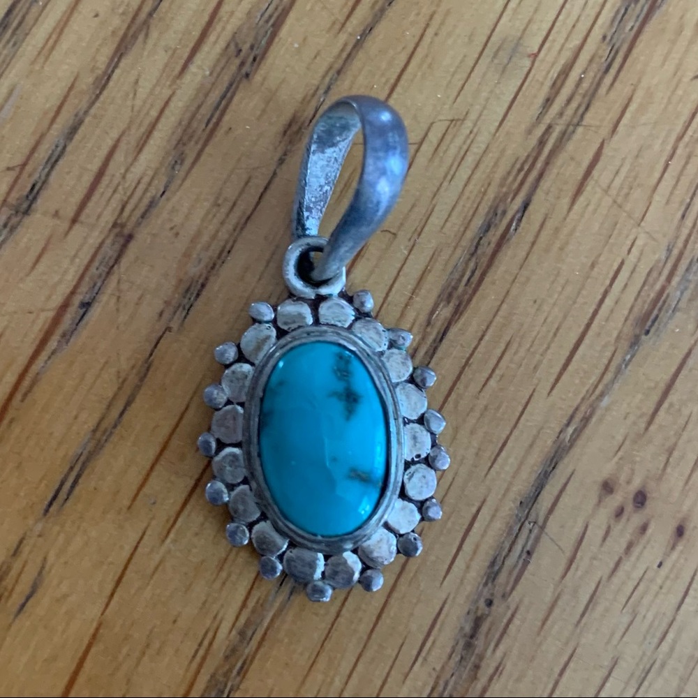 Turquoise and silver pendant